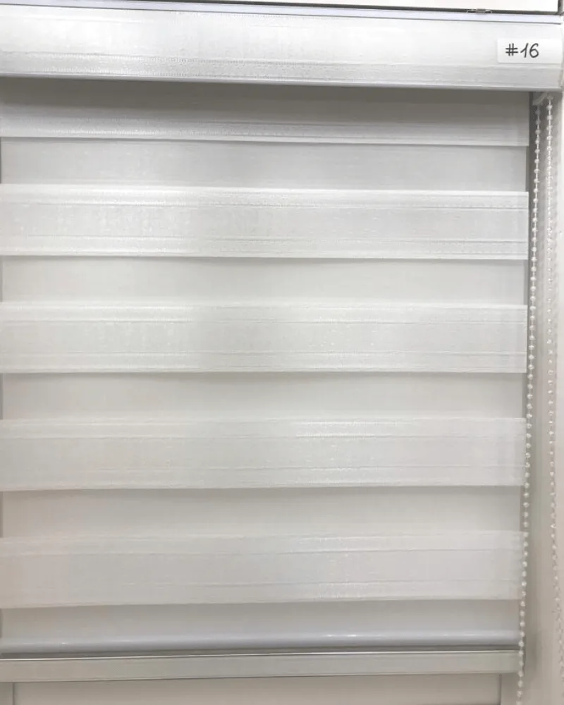 Close-up of a zebra shade showing alternating sheer and solid bands